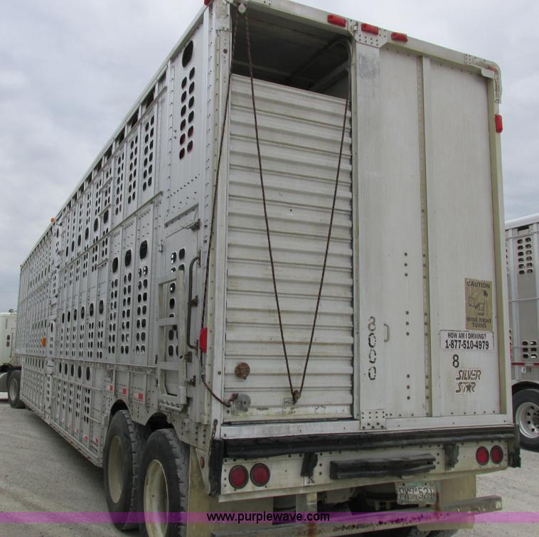 image for item I8890 1999 Wilson PSAL-303P aluminum livestock trailer
