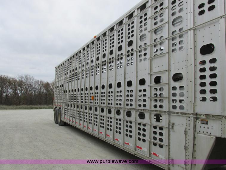 image for item I8890 1999 Wilson PSAL-303P aluminum livestock trailer
