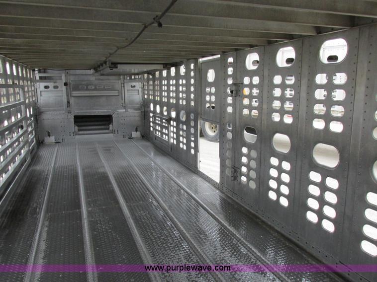 image for item I8890 1999 Wilson PSAL-303P aluminum livestock trailer