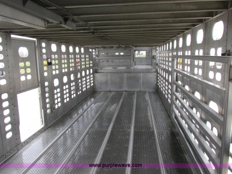 image for item I8890 1999 Wilson PSAL-303P aluminum livestock trailer