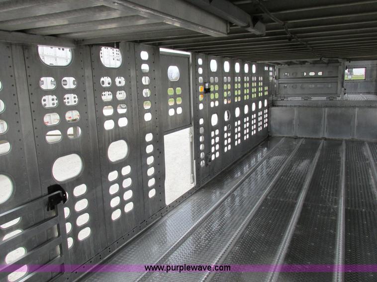 image for item I8890 1999 Wilson PSAL-303P aluminum livestock trailer