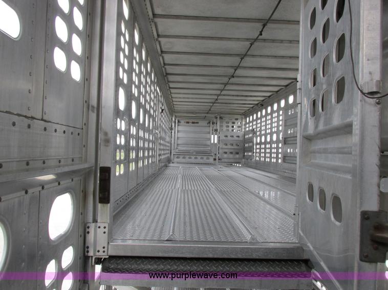 image for item I8890 1999 Wilson PSAL-303P aluminum livestock trailer