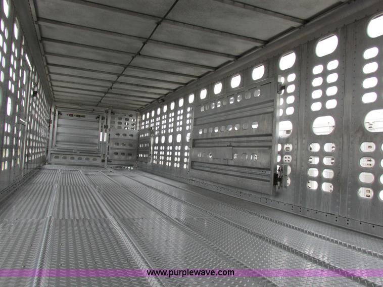 image for item I8890 1999 Wilson PSAL-303P aluminum livestock trailer