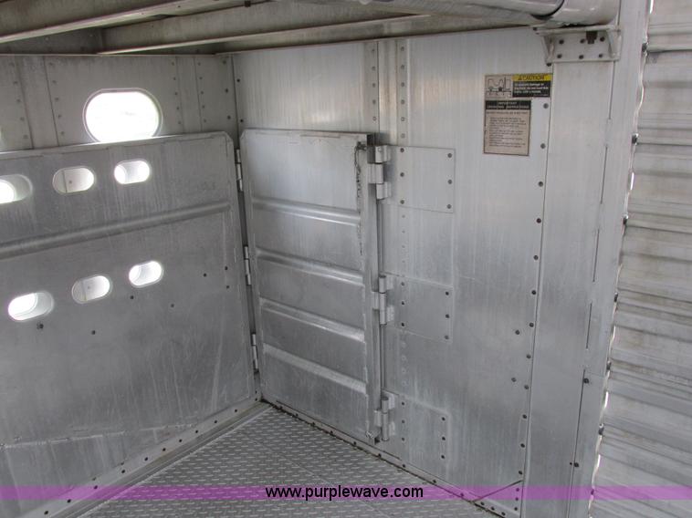 image for item I8890 1999 Wilson PSAL-303P aluminum livestock trailer