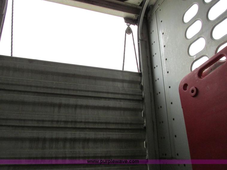 image for item I8890 1999 Wilson PSAL-303P aluminum livestock trailer