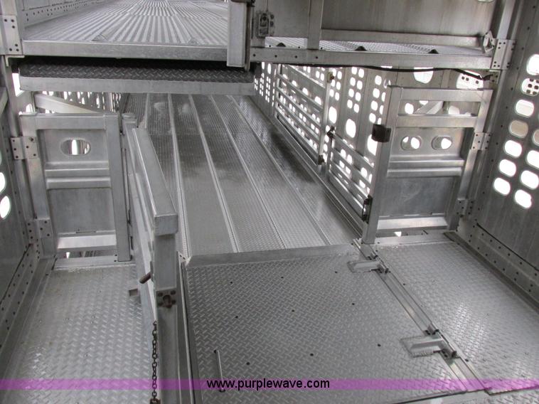 image for item I8890 1999 Wilson PSAL-303P aluminum livestock trailer