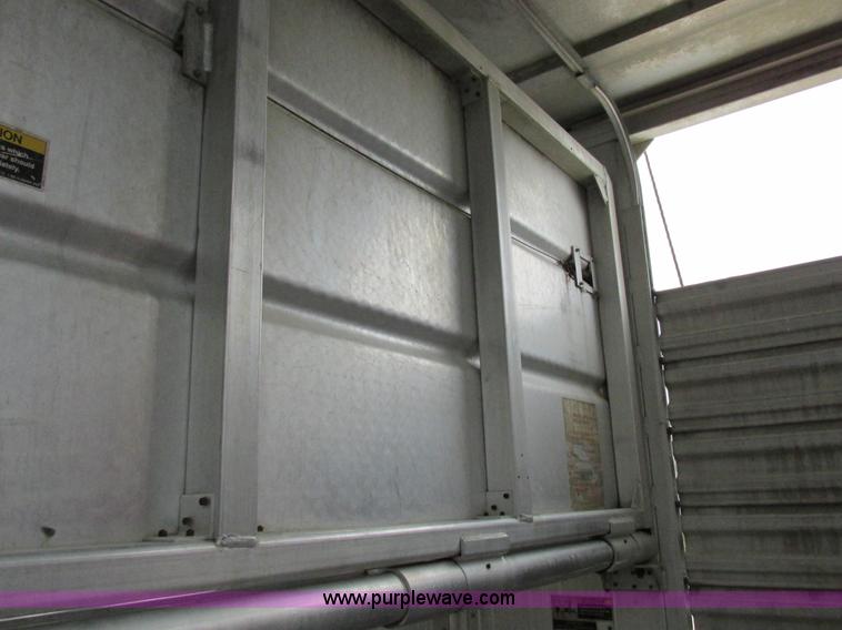 image for item I8890 1999 Wilson PSAL-303P aluminum livestock trailer
