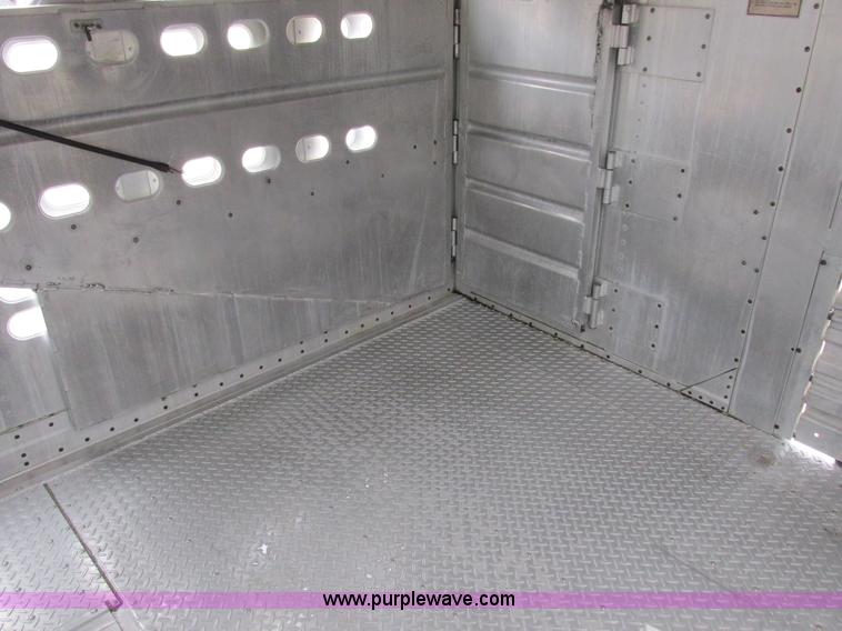 image for item I8890 1999 Wilson PSAL-303P aluminum livestock trailer