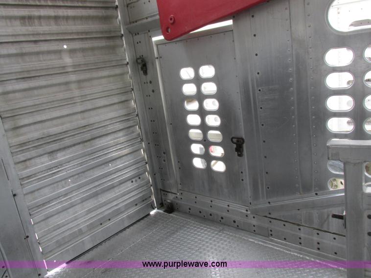 image for item I8890 1999 Wilson PSAL-303P aluminum livestock trailer