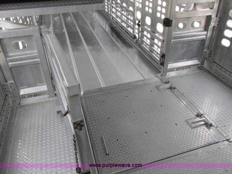 image for item I8890 1999 Wilson PSAL-303P aluminum livestock trailer