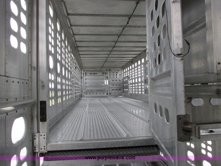 image for item I8890 1999 Wilson PSAL-303P aluminum livestock trailer
