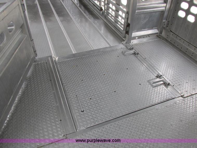 image for item I8890 1999 Wilson PSAL-303P aluminum livestock trailer