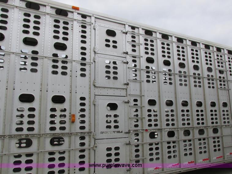 image for item I8890 1999 Wilson PSAL-303P aluminum livestock trailer