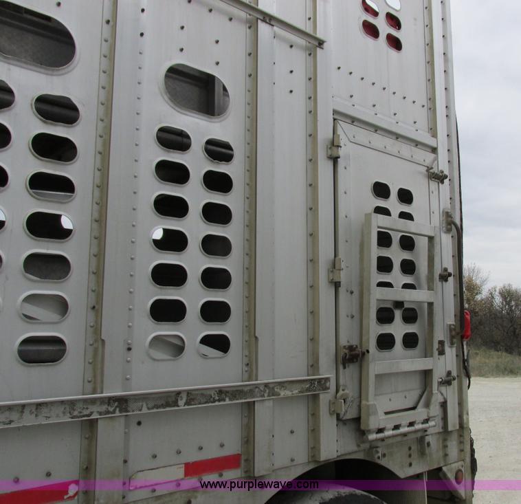 image for item I8890 1999 Wilson PSAL-303P aluminum livestock trailer