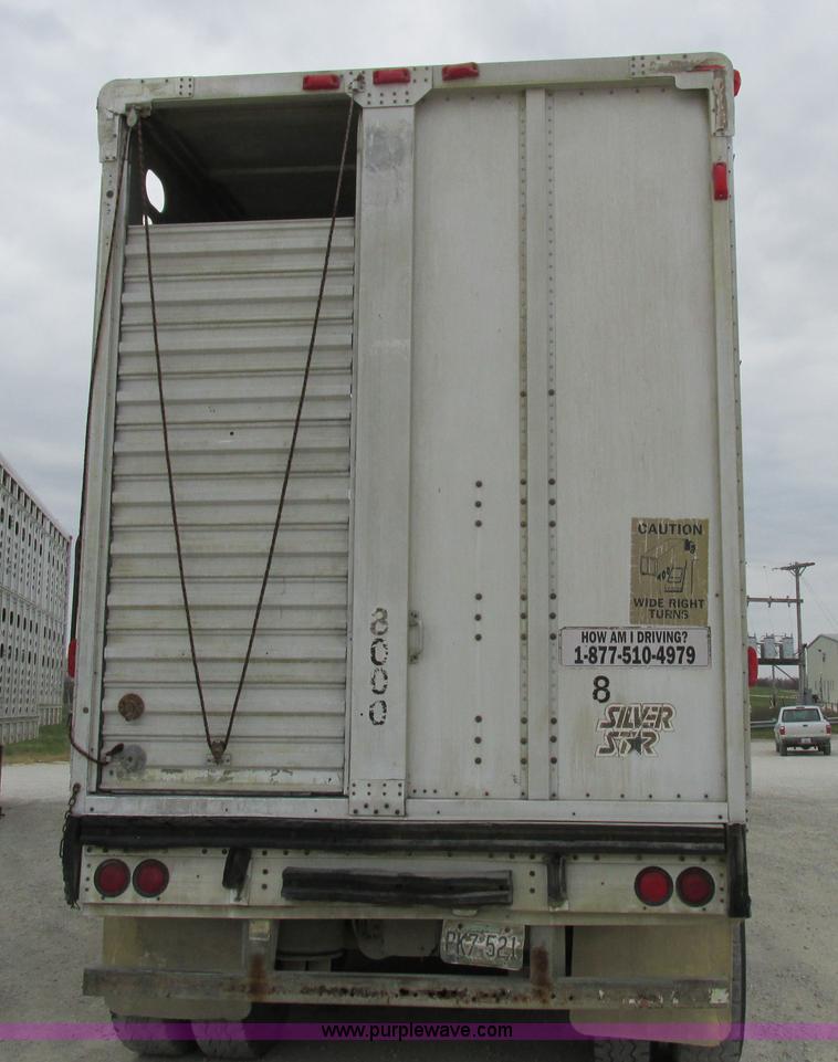 image for item I8890 1999 Wilson PSAL-303P aluminum livestock trailer