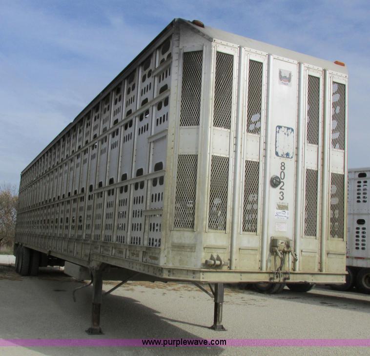 image for item I8891 2006 Barrett aluminum livestock trailer