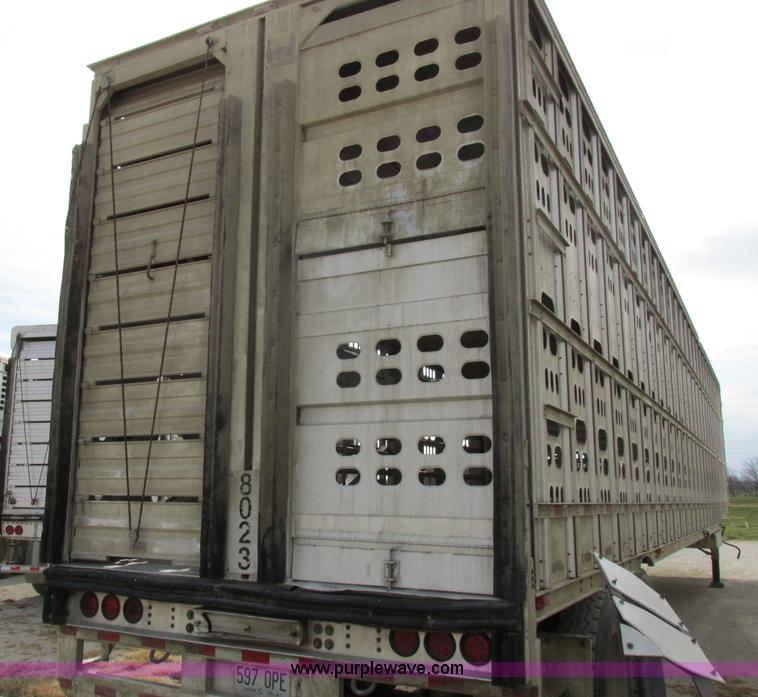 image for item I8891 2006 Barrett aluminum livestock trailer