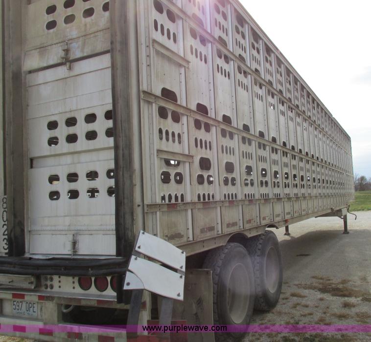 image for item I8891 2006 Barrett aluminum livestock trailer