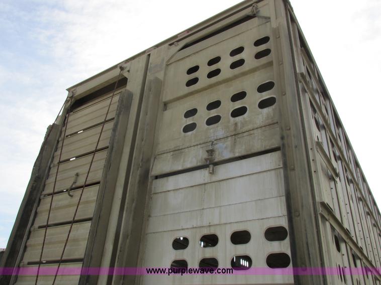 image for item I8891 2006 Barrett aluminum livestock trailer