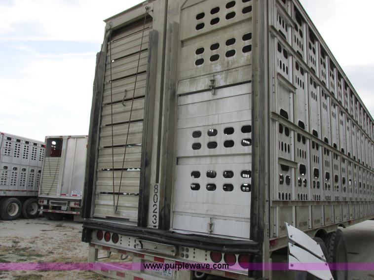 image for item I8891 2006 Barrett aluminum livestock trailer