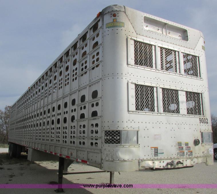 image for item I8899 2001 Wilson PSAL-303P aluminum livestock trailer