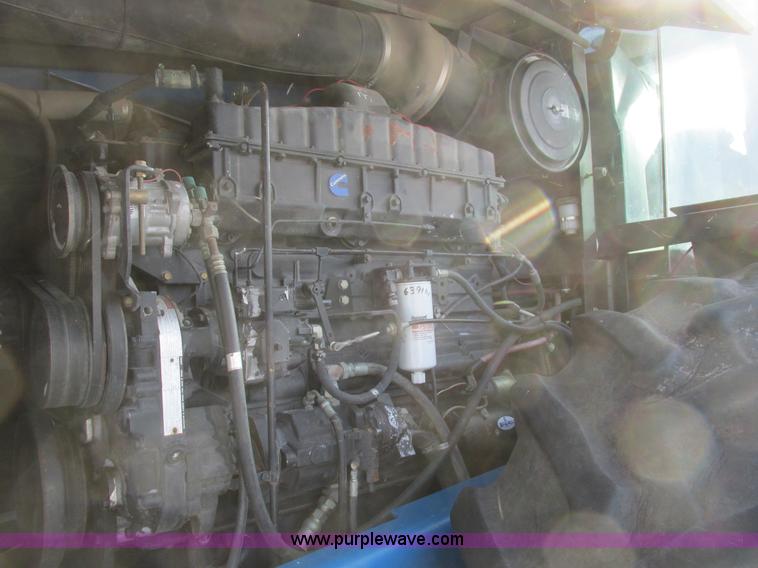 image for item A8766 1995 New Holland 9680 4WD tractor