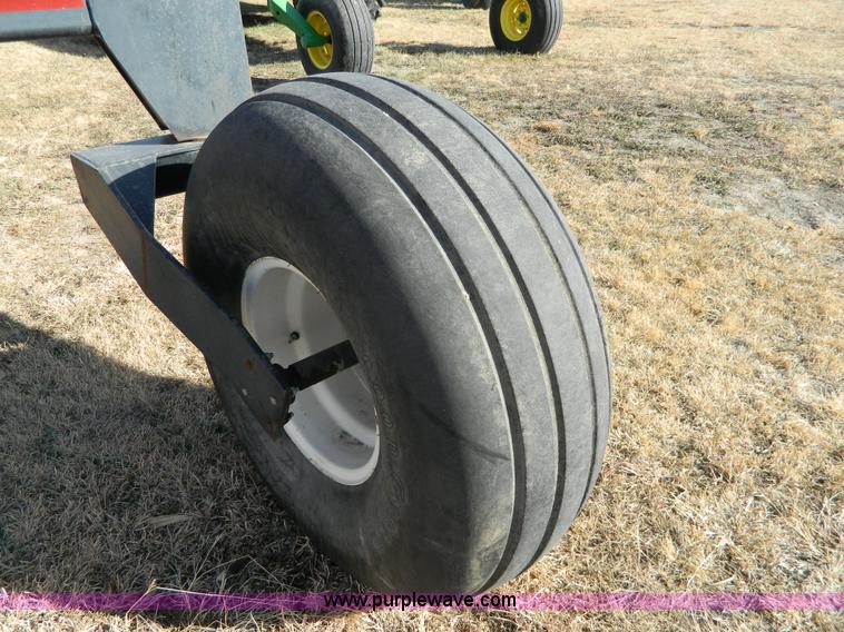 image for item H2318 2000 Mac Don 9350 self-propelled swather