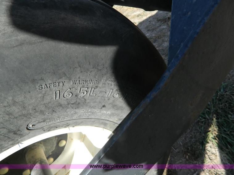 image for item H2318 2000 Mac Don 9350 self-propelled swather