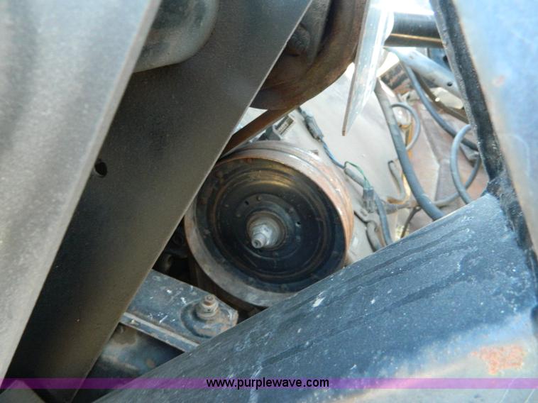 image for item H2318 2000 Mac Don 9350 self-propelled swather