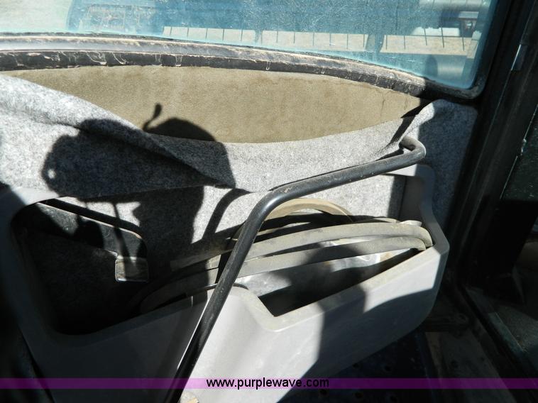 image for item H2318 2000 Mac Don 9350 self-propelled swather