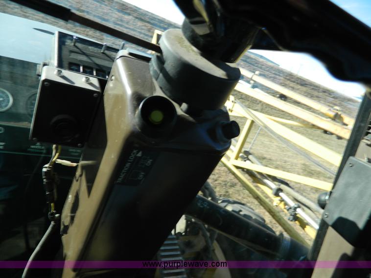 image for item H2320 1996 Ag-Chem RoGator 854 self-propelled sprayer