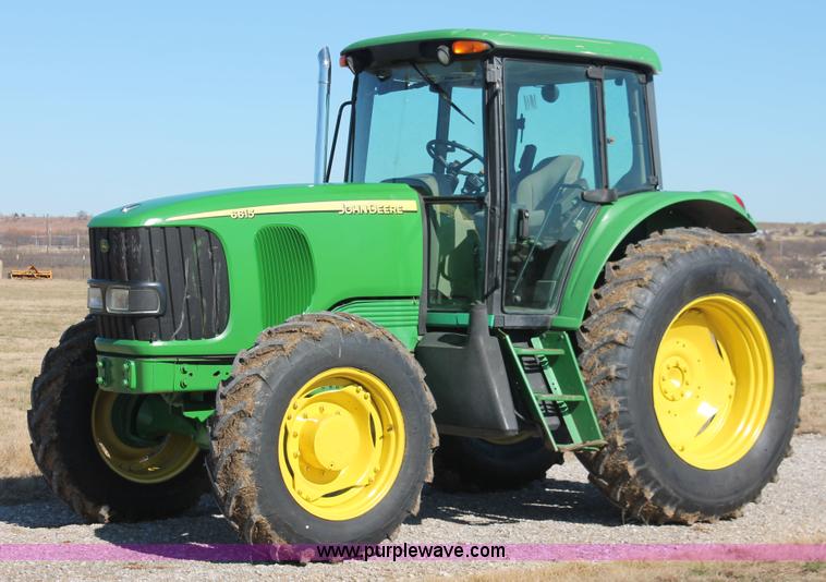 image for item H5509 2007 John Deere 6615 MFWD tractor