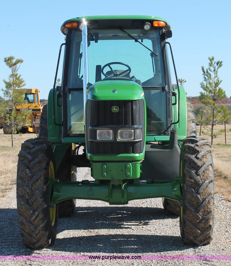 image for item H5509 2007 John Deere 6615 MFWD tractor