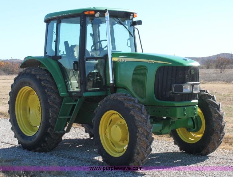 image for item H5509 2007 John Deere 6615 MFWD tractor