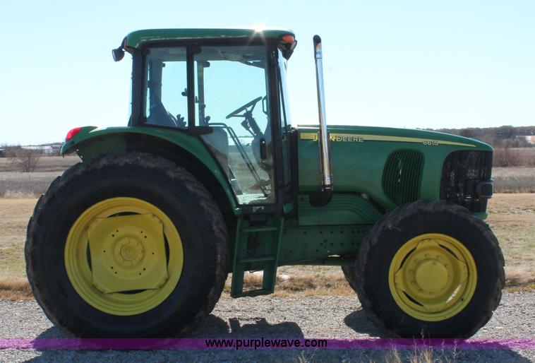 image for item H5509 2007 John Deere 6615 MFWD tractor