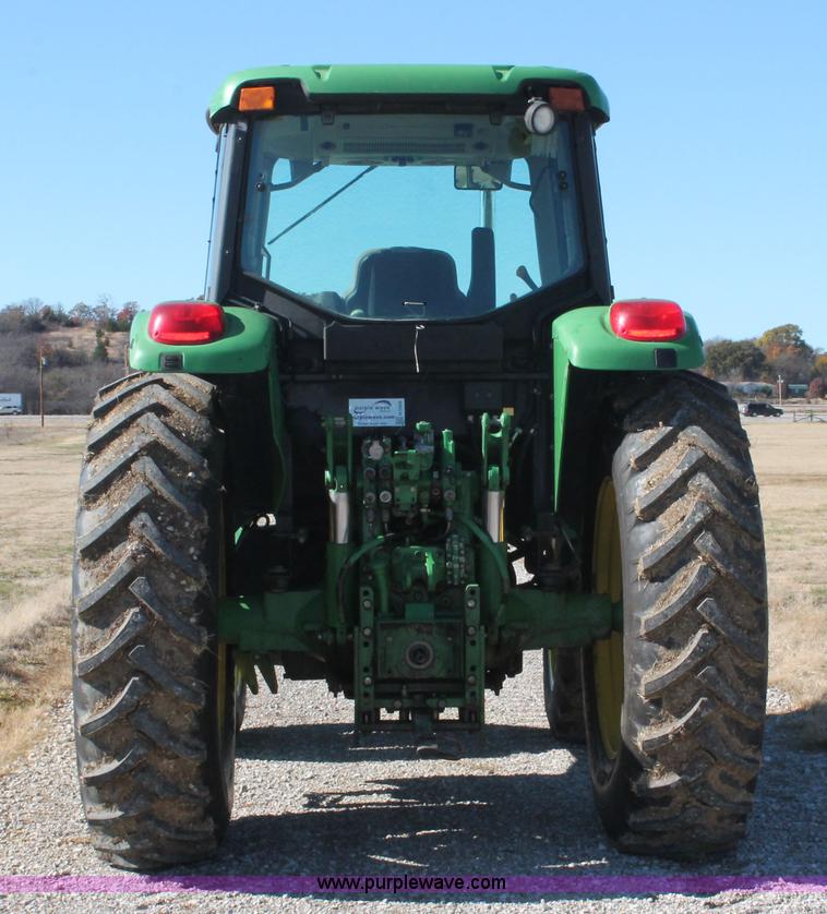 image for item H5509 2007 John Deere 6615 MFWD tractor