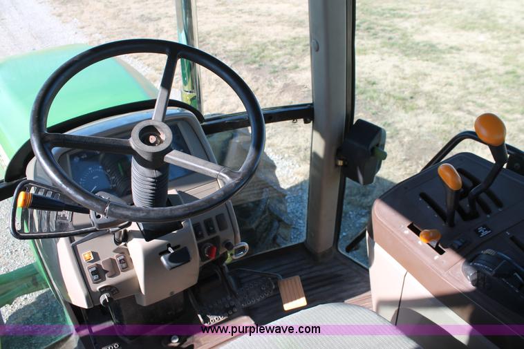 image for item H5509 2007 John Deere 6615 MFWD tractor