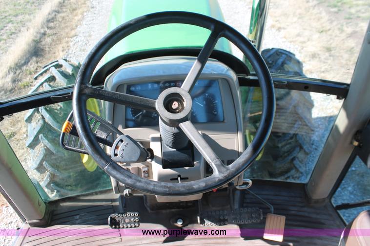 image for item H5509 2007 John Deere 6615 MFWD tractor