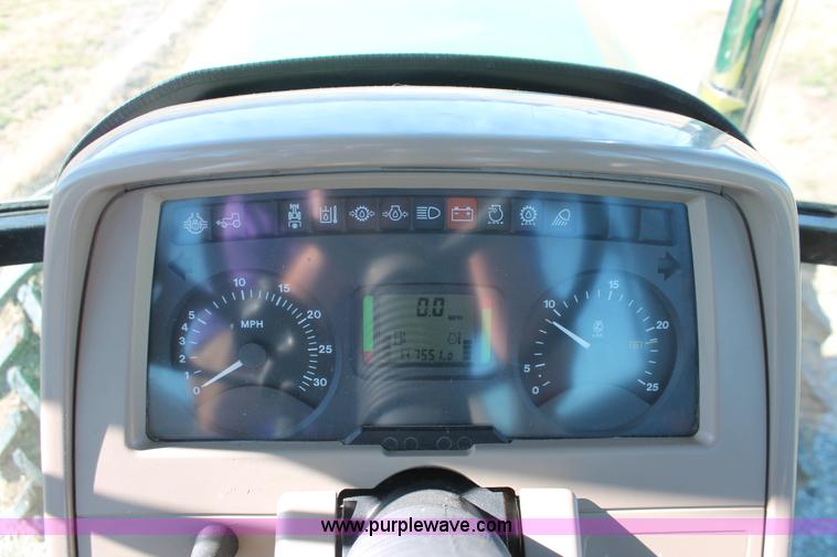 image for item H5509 2007 John Deere 6615 MFWD tractor