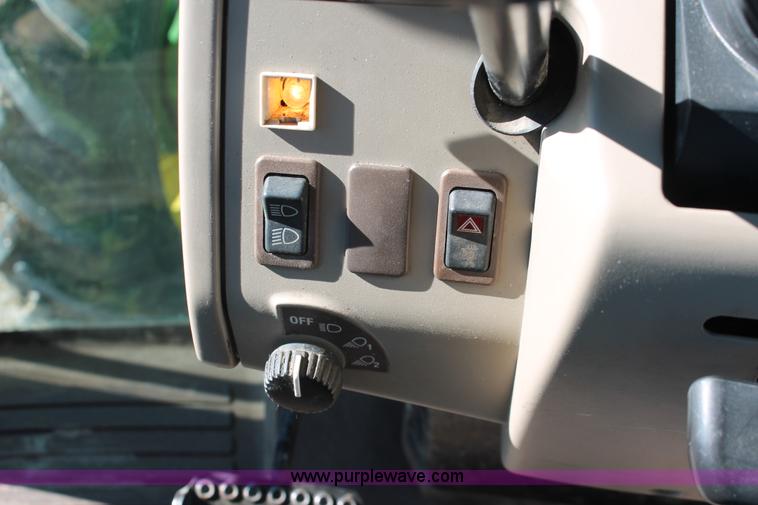 image for item H5509 2007 John Deere 6615 MFWD tractor