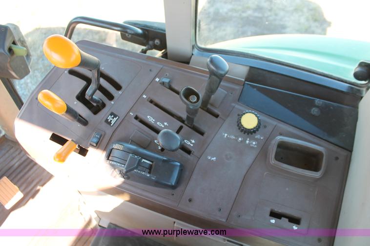 image for item H5509 2007 John Deere 6615 MFWD tractor