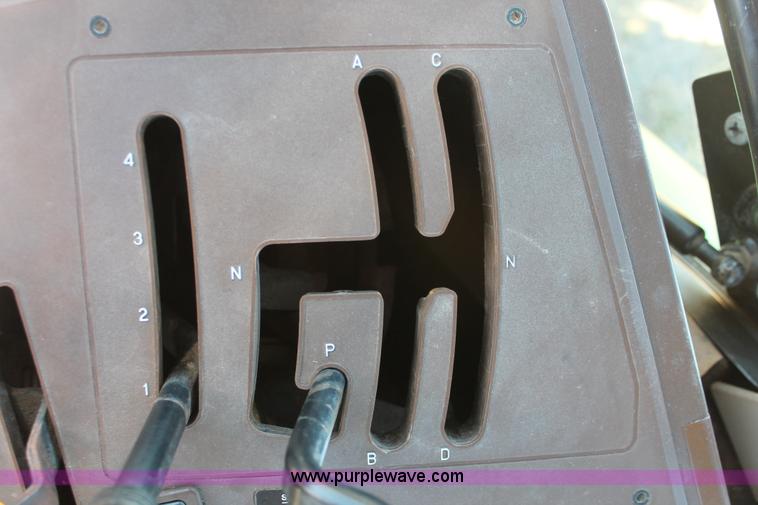 image for item H5509 2007 John Deere 6615 MFWD tractor