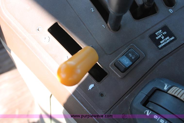 image for item H5509 2007 John Deere 6615 MFWD tractor