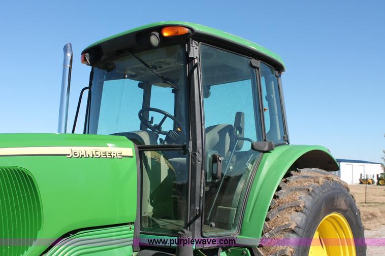 image for item H5509 2007 John Deere 6615 MFWD tractor