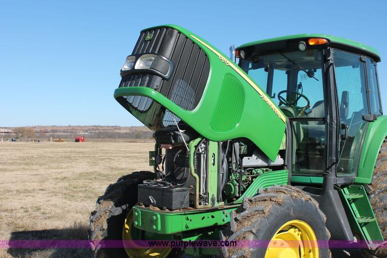 image for item H5509 2007 John Deere 6615 MFWD tractor