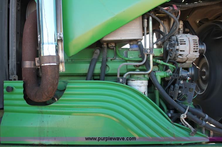 image for item H5509 2007 John Deere 6615 MFWD tractor