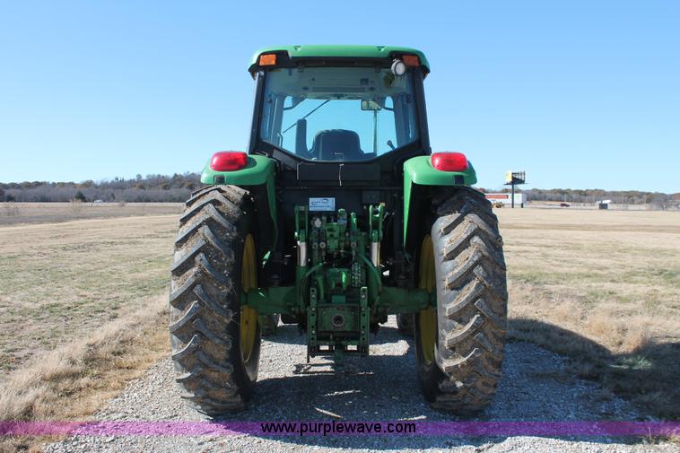 image for item H5509 2007 John Deere 6615 MFWD tractor