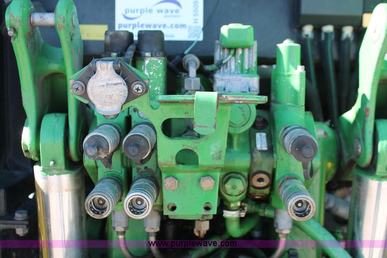 image for item H5509 2007 John Deere 6615 MFWD tractor