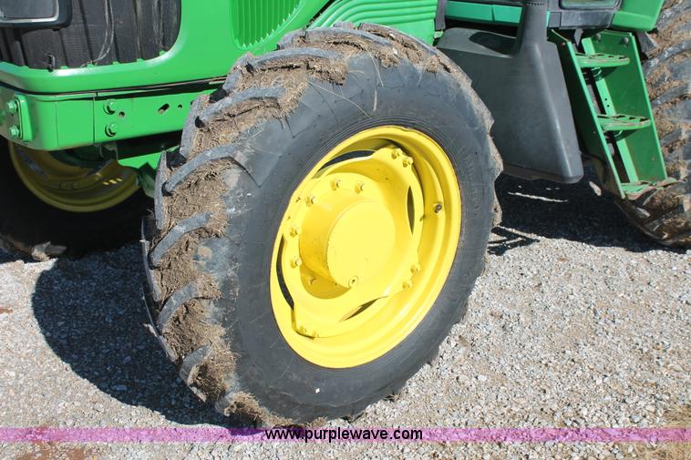 image for item H5509 2007 John Deere 6615 MFWD tractor