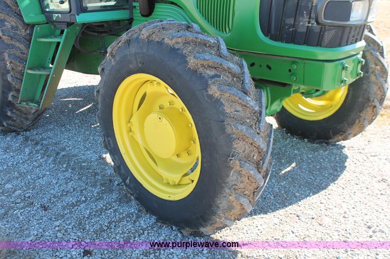 image for item H5509 2007 John Deere 6615 MFWD tractor